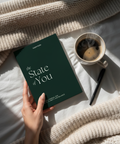 Guidet journal "The State of You" fra Superstate, liggende på et koselig teppe med en kopp kaffe og en penn, som fremmer klarhet og balanse.